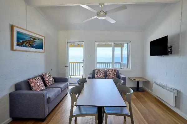 Living room with an ocean view from of one of the newly refurbished Longreach Bay units.