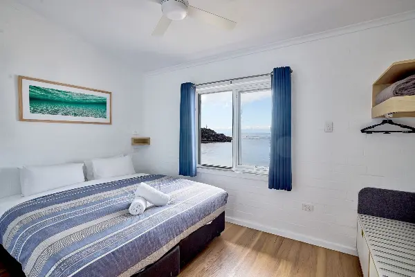 Master bedroom with an ocean view from one of the newly refurbished Longreach Bay units.