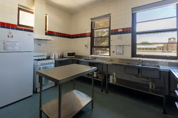 Stainless steel kitchen in the dormitory.