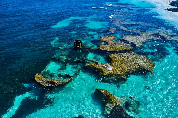 Aerial view of the Shark shipwreck on the shore of Wadjemup / Rottnest Island.