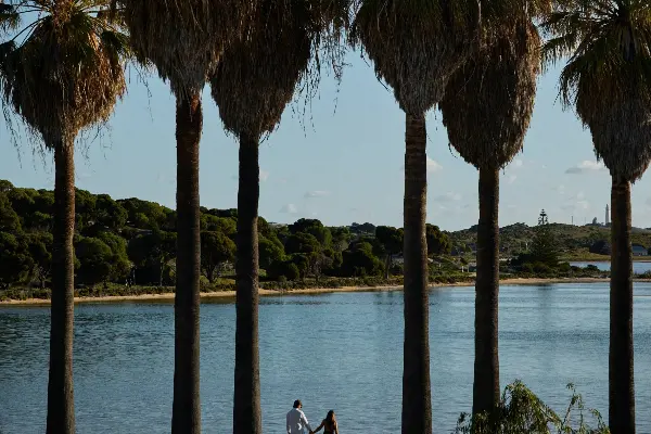 Couple enjoying a lakeside walk