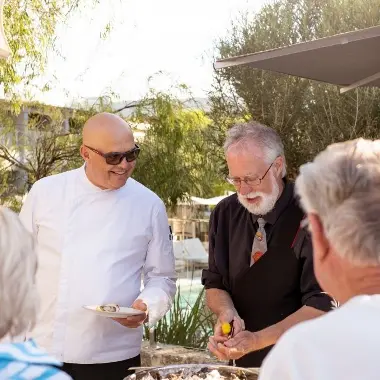 A chef doing a live cooking demonstration.