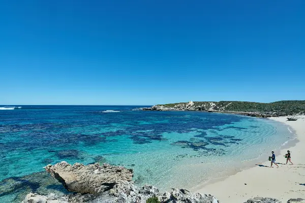 Couple enjoying the turquoise water and snorkelling at Mary Cove.