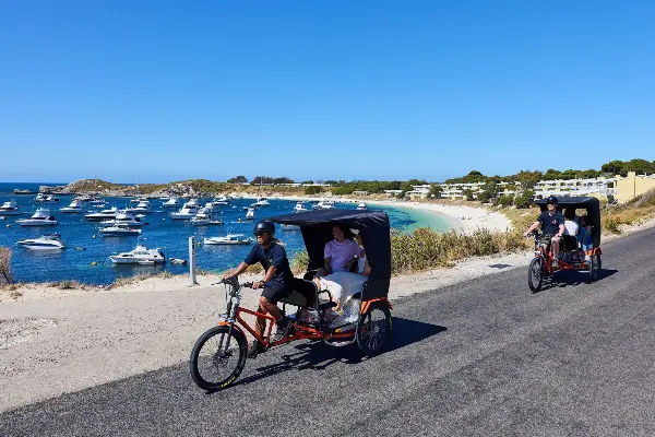 Two rickshaws riding along Geordie Bay
