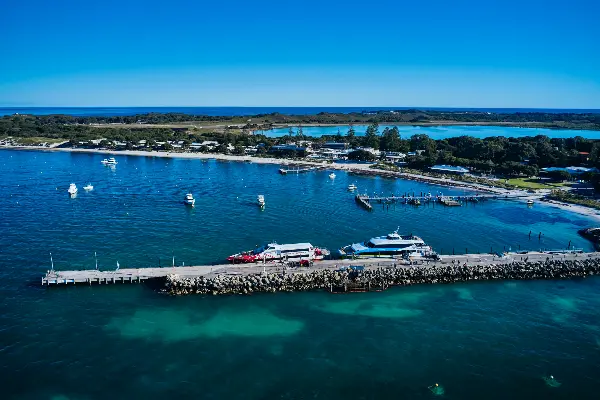 Aerial view of ferries and boats on the water at Main Jetty in Thomson Bay.