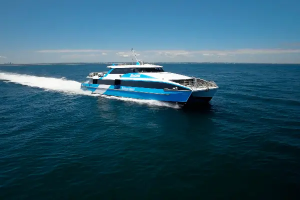 SeaLink Rottnest ferry cruising across clear blue ocean waters