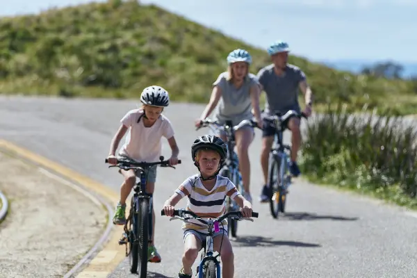 Family riding home from Oliver Hill.