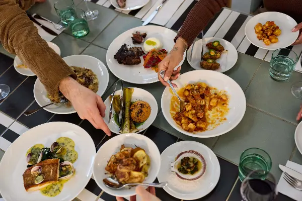 A shared meal with drinks.