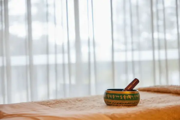 A bowl sitting on a towel